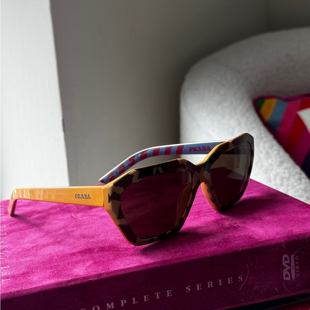 Prada Women's Sunglasses in Tortoise and Gold